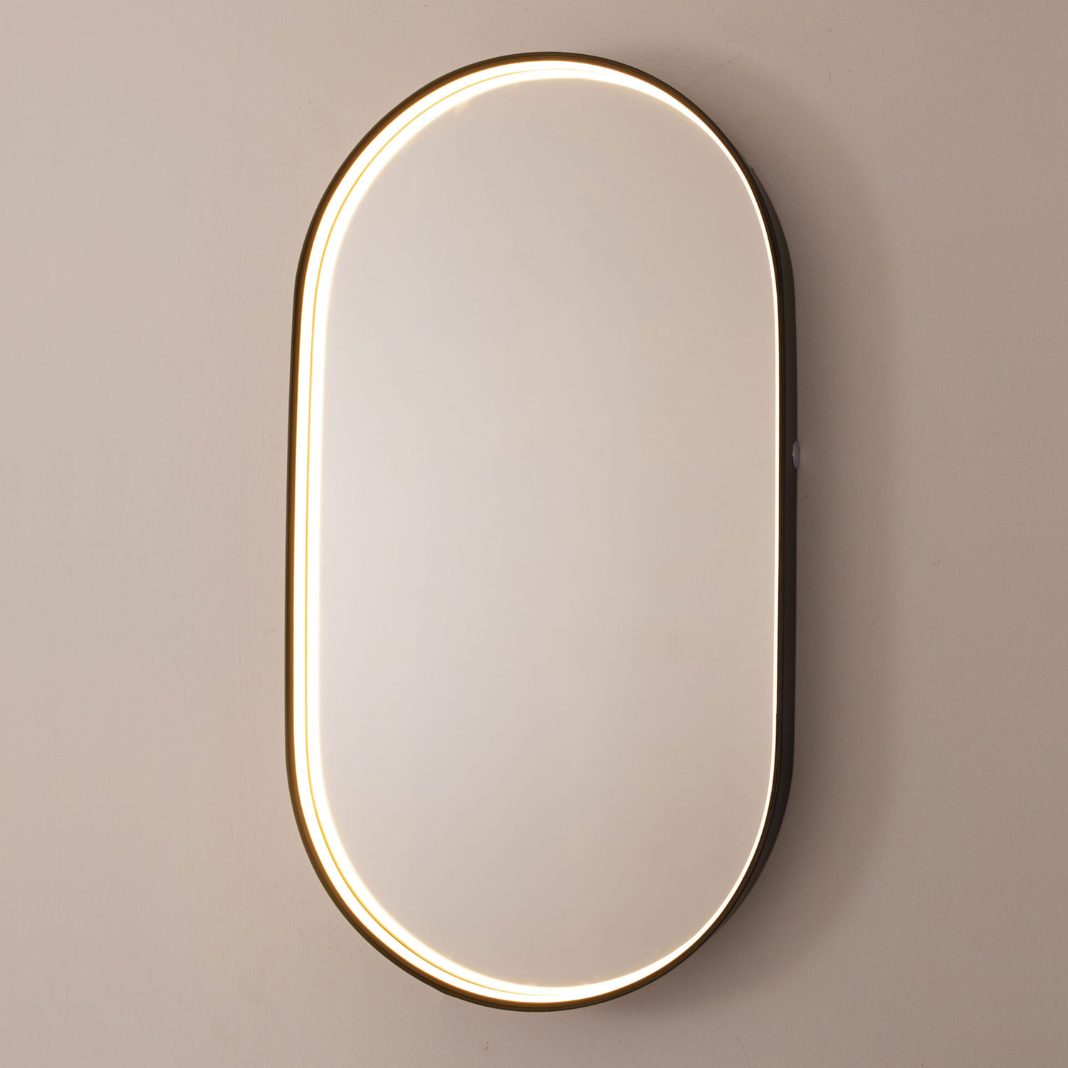 Oval brass mirror with LED lighting
