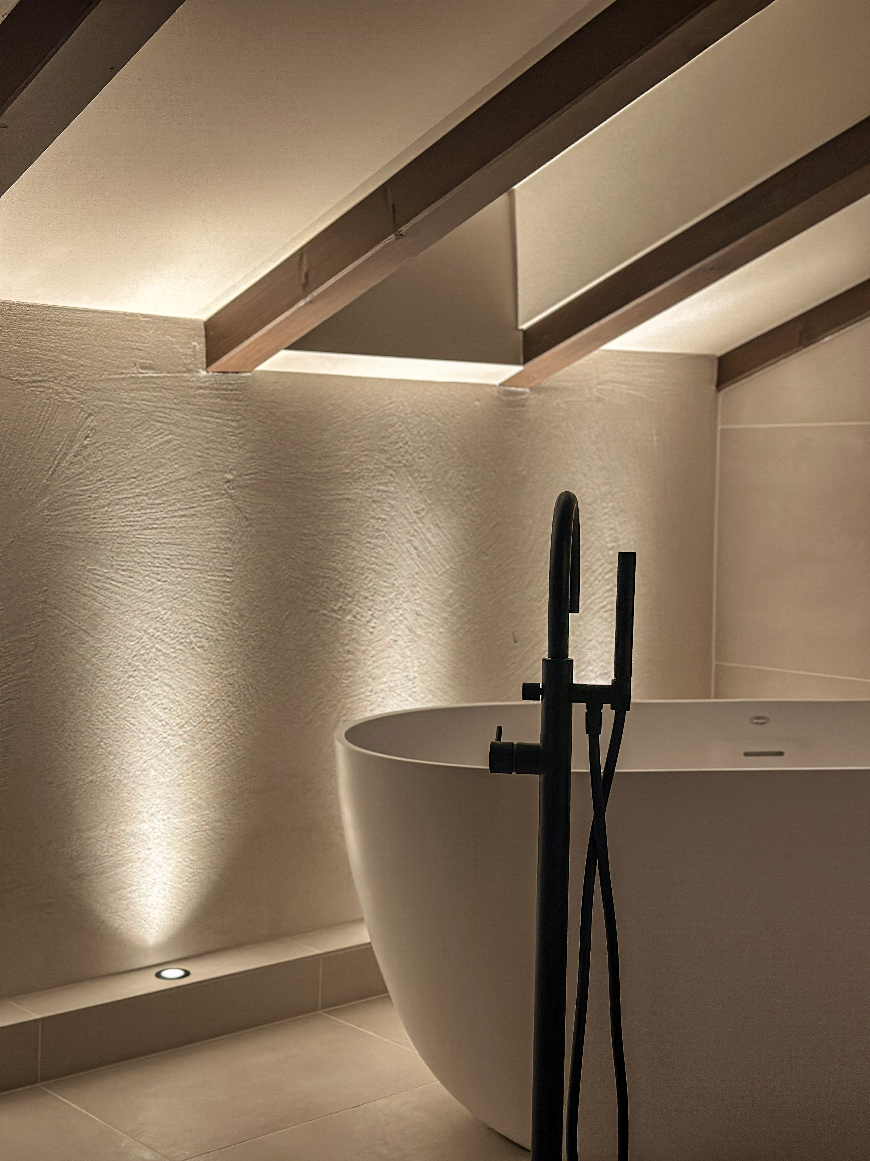Recessed floor spotlights in the bathroom for ambient lighting