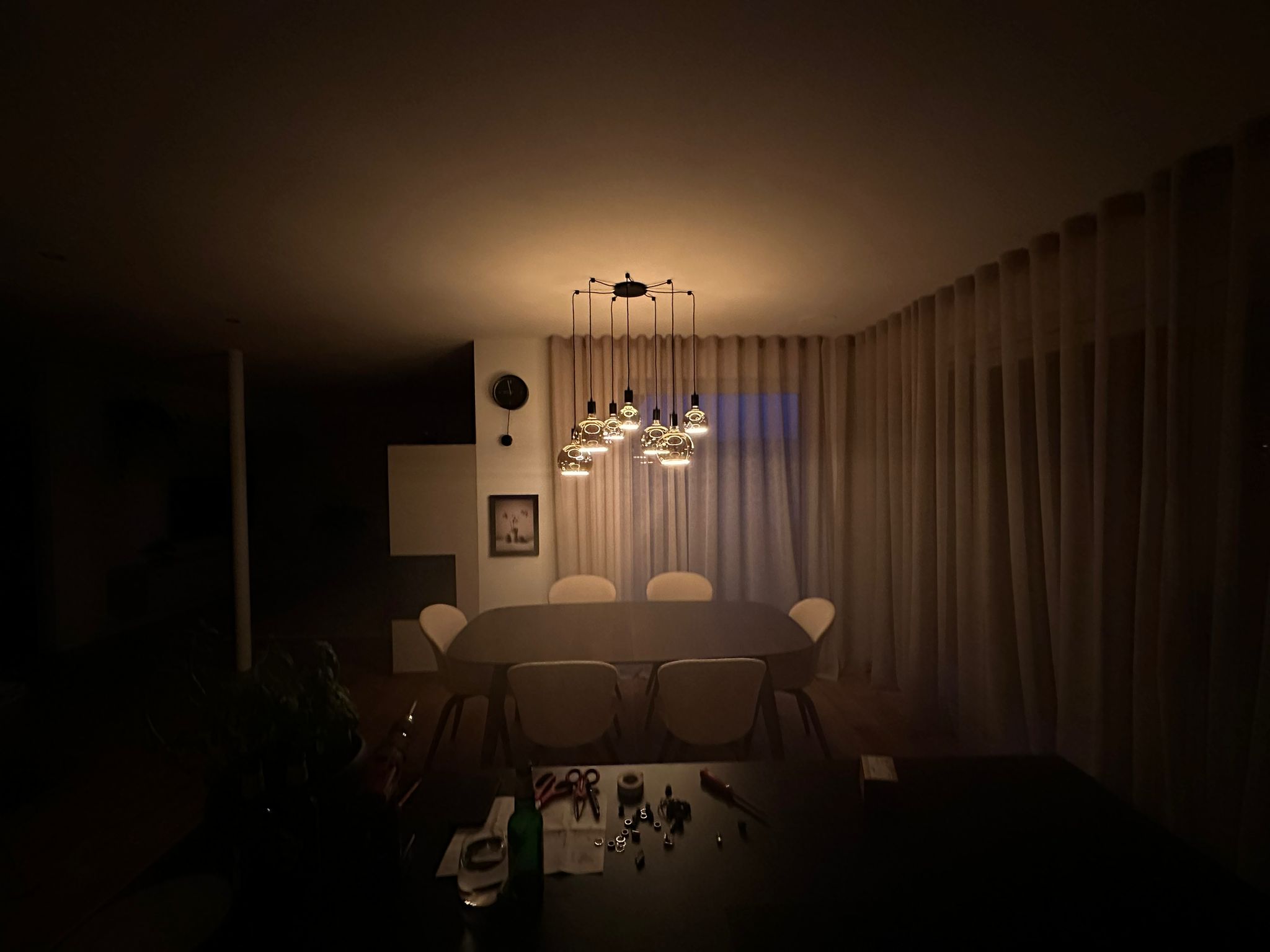 Dining table lighting with a group of different Segula floating bulbs